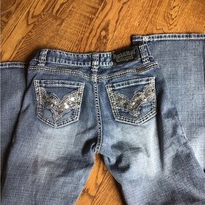 Rock and Roll Cowgirl bootcut bling jeans.